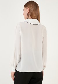 Button-Down Blouse with Black Scallop Trim